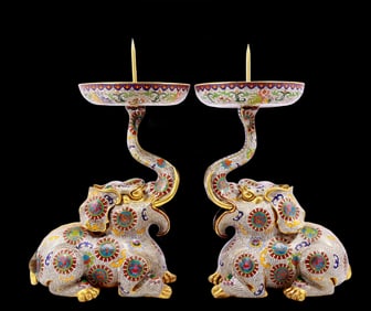 A pair of exquisite cloisonné elephant candlesticks