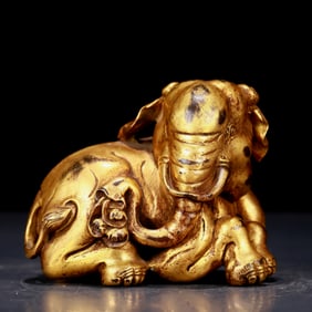 An exquisite gilt bronze elephant ornament