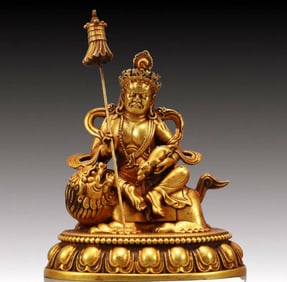A Solemn Gilt Bronze Statue of Mammon