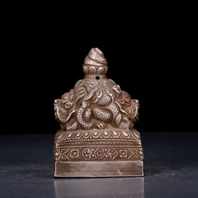 An exquisite silver dragon seal
