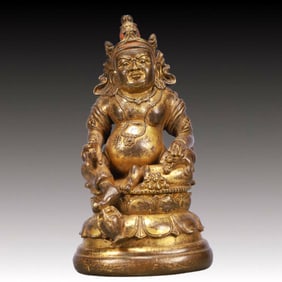 A Solemn Gilt Bronze Statue of Mammon