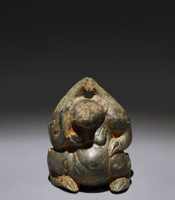 An Archaic Bronze Bear Ornament