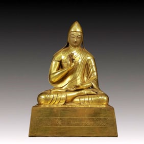 A Solemn Gilt Bronze Statue of Guru