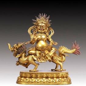 A Solemn Gilt Bronze Statue of Mammon Rides the Dragon
