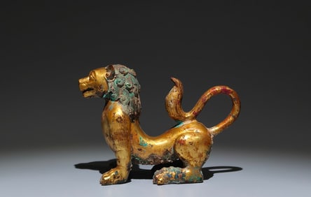 An Exquisite Gilt Bronze Lion Ornament