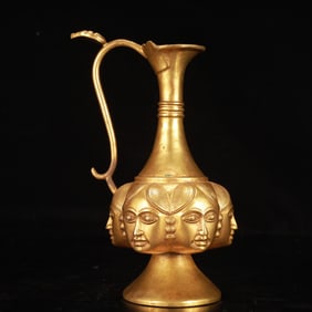 An Exquisite Gilt Bronze Figure-Face Pattern Ewer