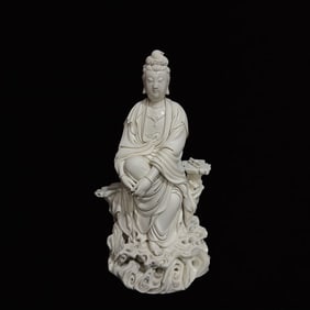 A Solemn Blance-De-Chine Statue of Avalokitesvara