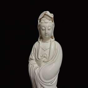 A Solemn Blance-De-Chine Statue of Avalokitesvara
