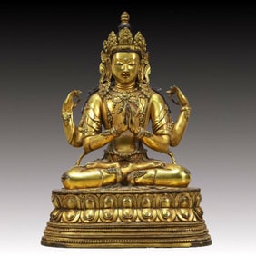 A Solemn Gilt Bronze Statue of Four-arms Guanyin