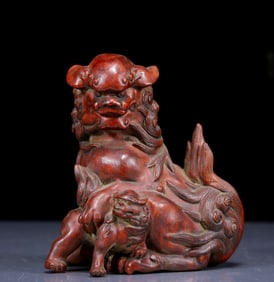 An Exquisite Zitanwood Lion Ornament