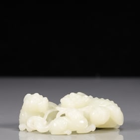 An Exquisite White Jade Auspicious Beast Ornament