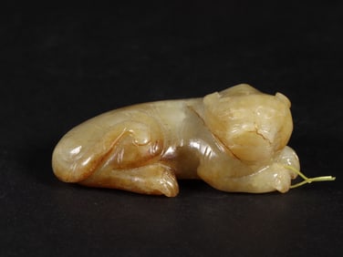An Exquisite White Jade Auspicious Beast Ornament