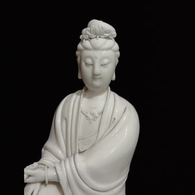 A Solemn Blance-De-Chine Statue of Avalokitesvara