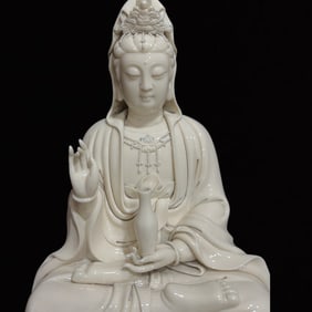 A Solemn Blance-De-Chine Statue of Avalokitesvara