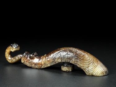 An Exquisite White Jade Dragon Ornament