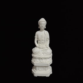 A Solemn Blance-De-Chine Statue of Sakyamuni