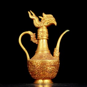 An exquisite gilt bronze pot with phoenix pattern