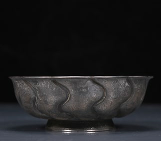 An Exquisite Silver Lotus and Auspicious Beast Pattern Bowl