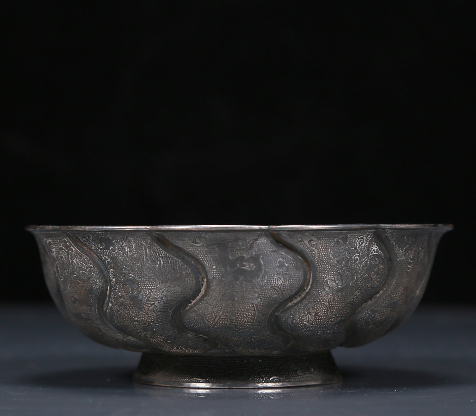 An Exquisite Silver Lotus and Auspicious Beast Pattern Bowl (1 of 5)