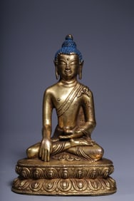 A Rare Gilt Bronze Statue of Sakyamuni