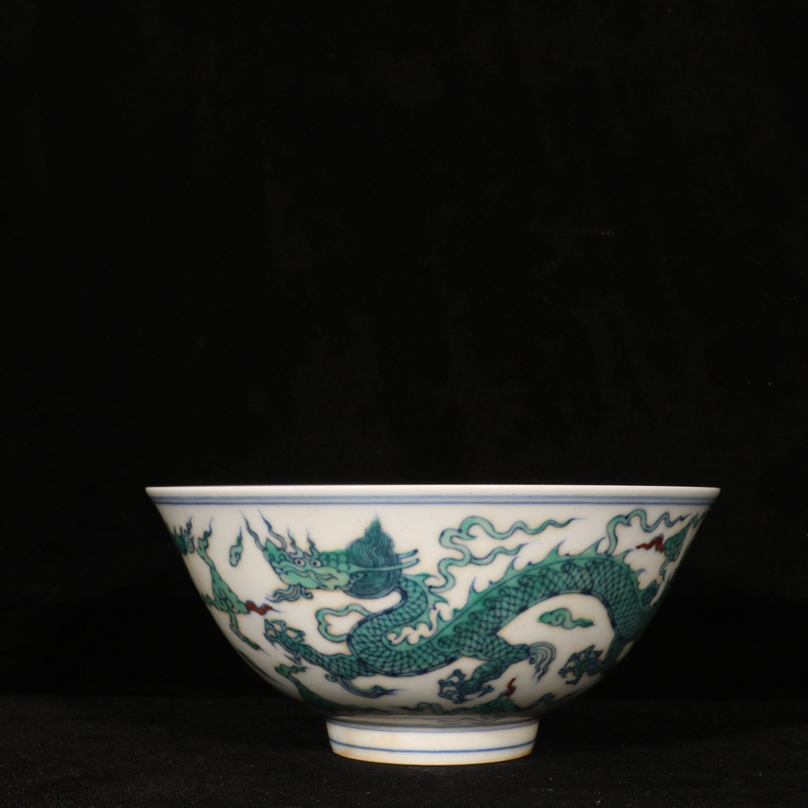 An Exquisite Doucai Auspicious Cloud and Dragon Pattern Bowl: An Exquisite Doucai Auspicious Cloud and Dragon Pattern Bowl,Ming Dynasty,China,Chenghua Six-Character Mark,Size:2.6inx5.9in 斗彩祥云龙纹碗,中国&#