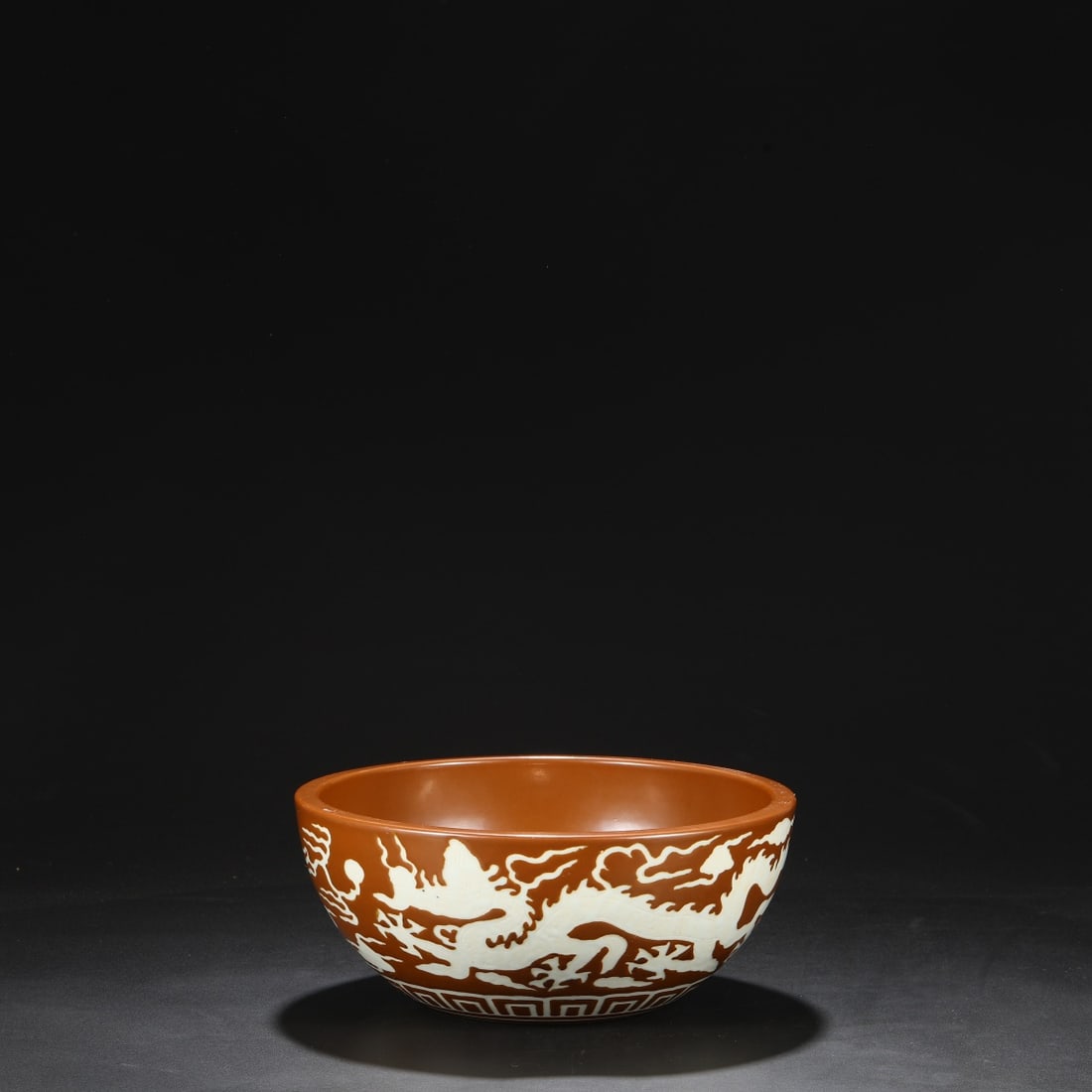 An Exquisite Purple and Gold Glazed Dragon Pattern Brush Washer: An Exquisite Purple and Gold Glazed Dragon Pattern Brush Washer,Ming Dynasty,China,Xuande Six-Character Mark,Size:4.7inx10.6in 紫金釉龙纹笔洗,中国