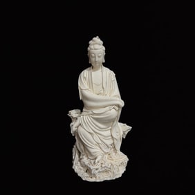 A Solemn Blance-De-Chine Statue of Avalokitesvara
