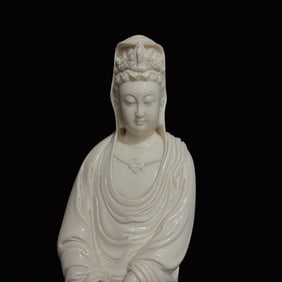 A Solemn Blance-De-Chine Statue of Avalokitesvara