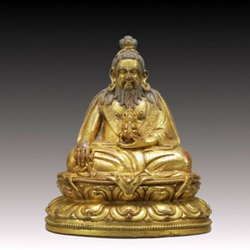 A Solemn Gilt Bronze Statue of Guru