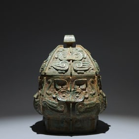 An Archaic Bronze Beast-Face Pattern Ritual vessel