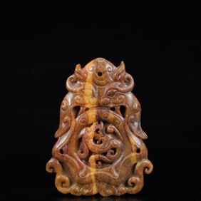A Rare Gaogu yu Beast-Face Pendant