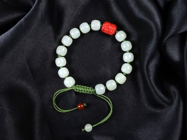 An Exquisite White Jade Bracelets