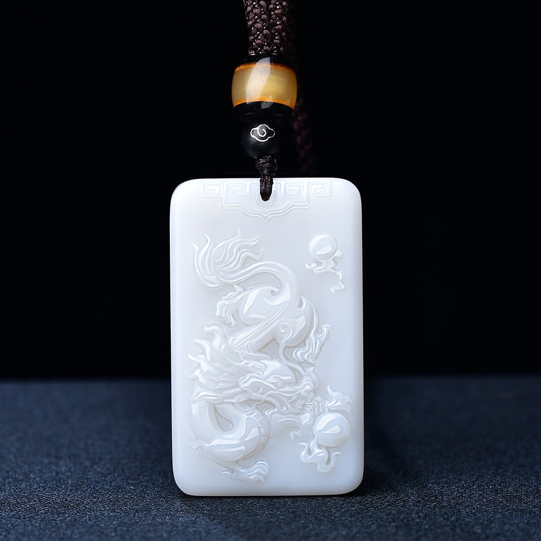 An Exquisite White Jade Dragon Pattern Pendant (1 of 5)