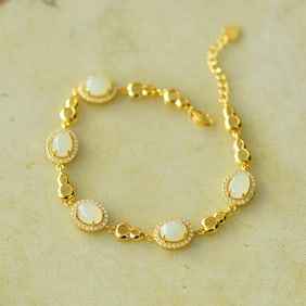 An Exquisite Sterling Silver-Gold Plated Inlaid White Jade Bracelet