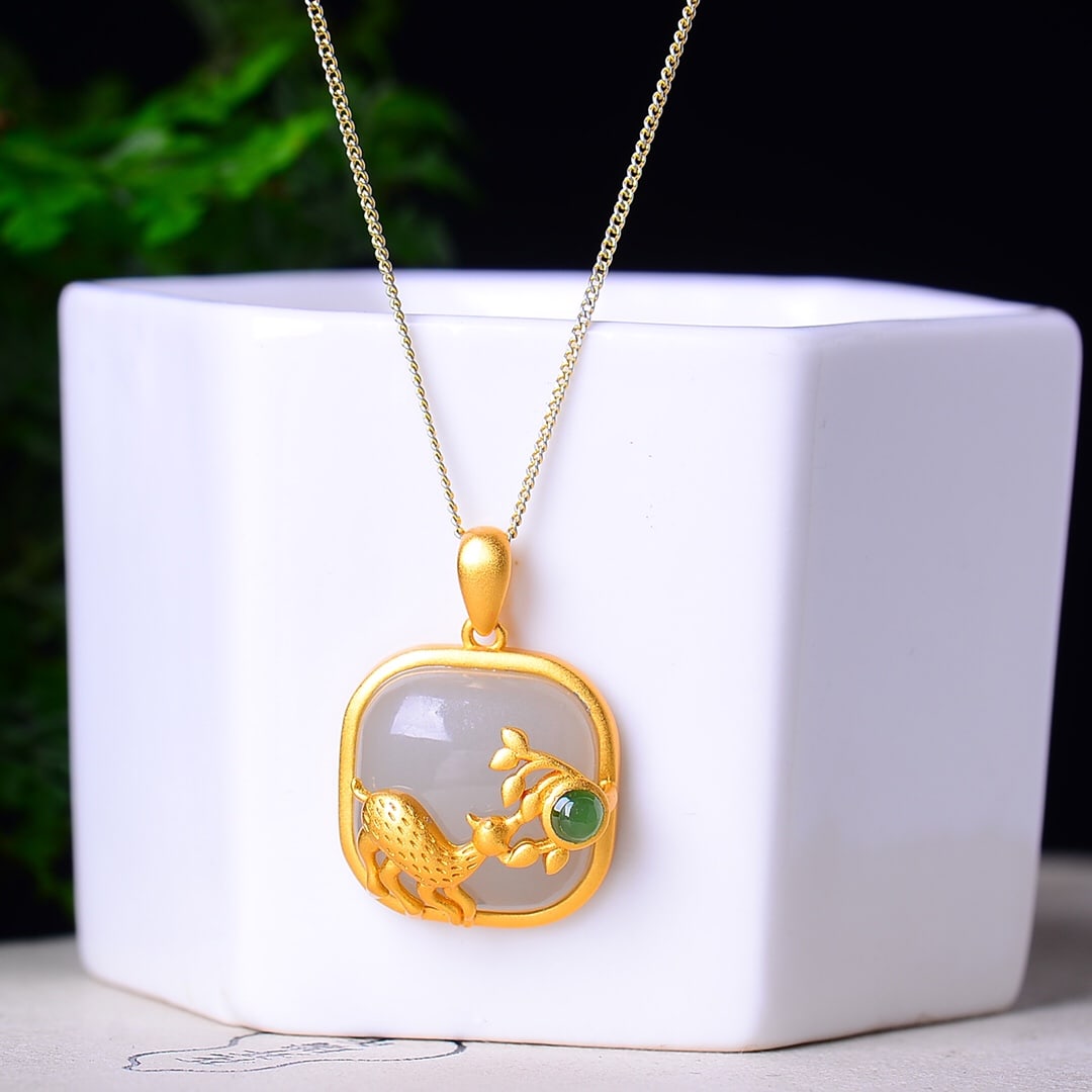 An Exquisite Sterling Silver-Gold Plated Inlaid White Jade Pendant: An Exquisite Sterling Silver-Gold Plated Inlaid White Jade Pendant,Size:0.6inx0.6in 纯银镀金镶白玉吊坠