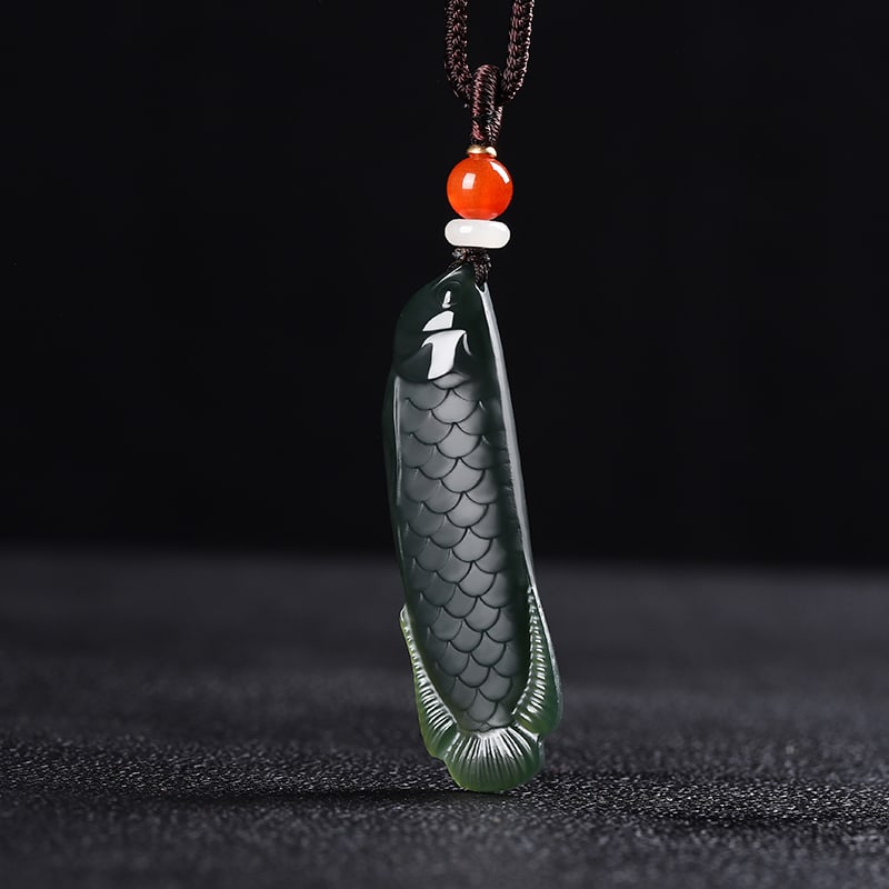An Exquisite Cyan jade Fish Pendant: An Exquisite Cyan jade Fish Pendant,Size:2inx0.6inx0.3in 青玉鱼挂件