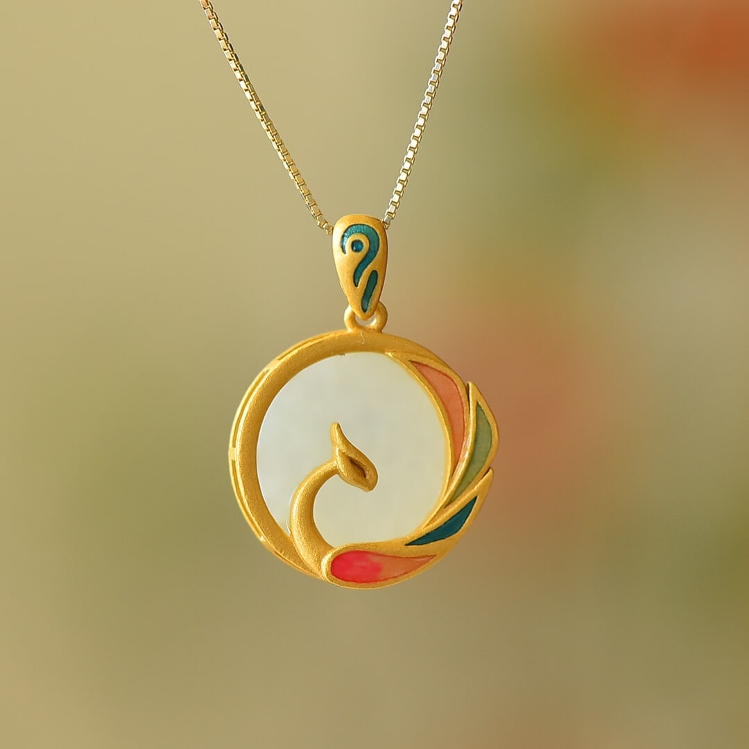 An Exquisite Sterling Silver-Gold Plated Inlaid White Jade Pendant: An Exquisite Sterling Silver-Gold Plated Inlaid White Jade Pendant,Size:0.6inx0.2in 纯银镀金镶白玉吊坠