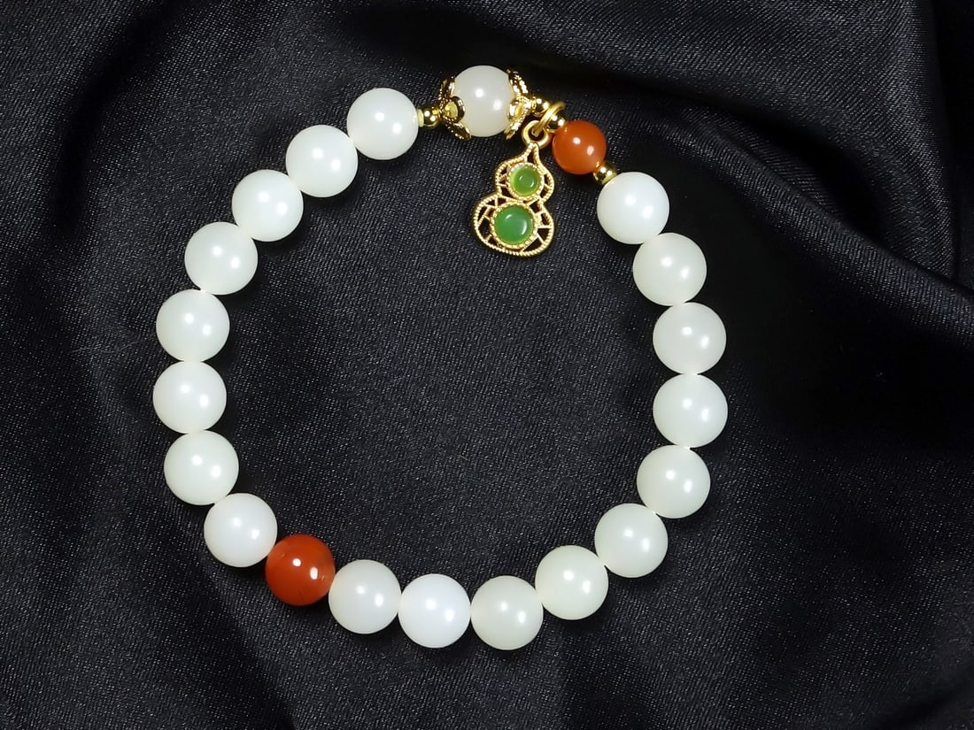 An Exquisite White Jade Bracelets (1 of 4)