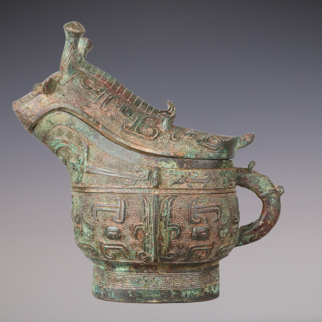 An Exquisite Bronze Beast-Face Pattern Auspicious Beast-Shaped Ewer (1 of 9)