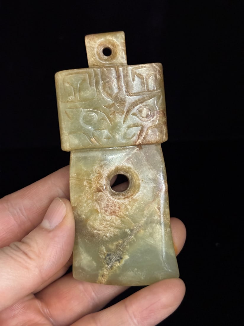 An Exquisite White Jade Beast-Face Pattern Ornament (1 of 9)