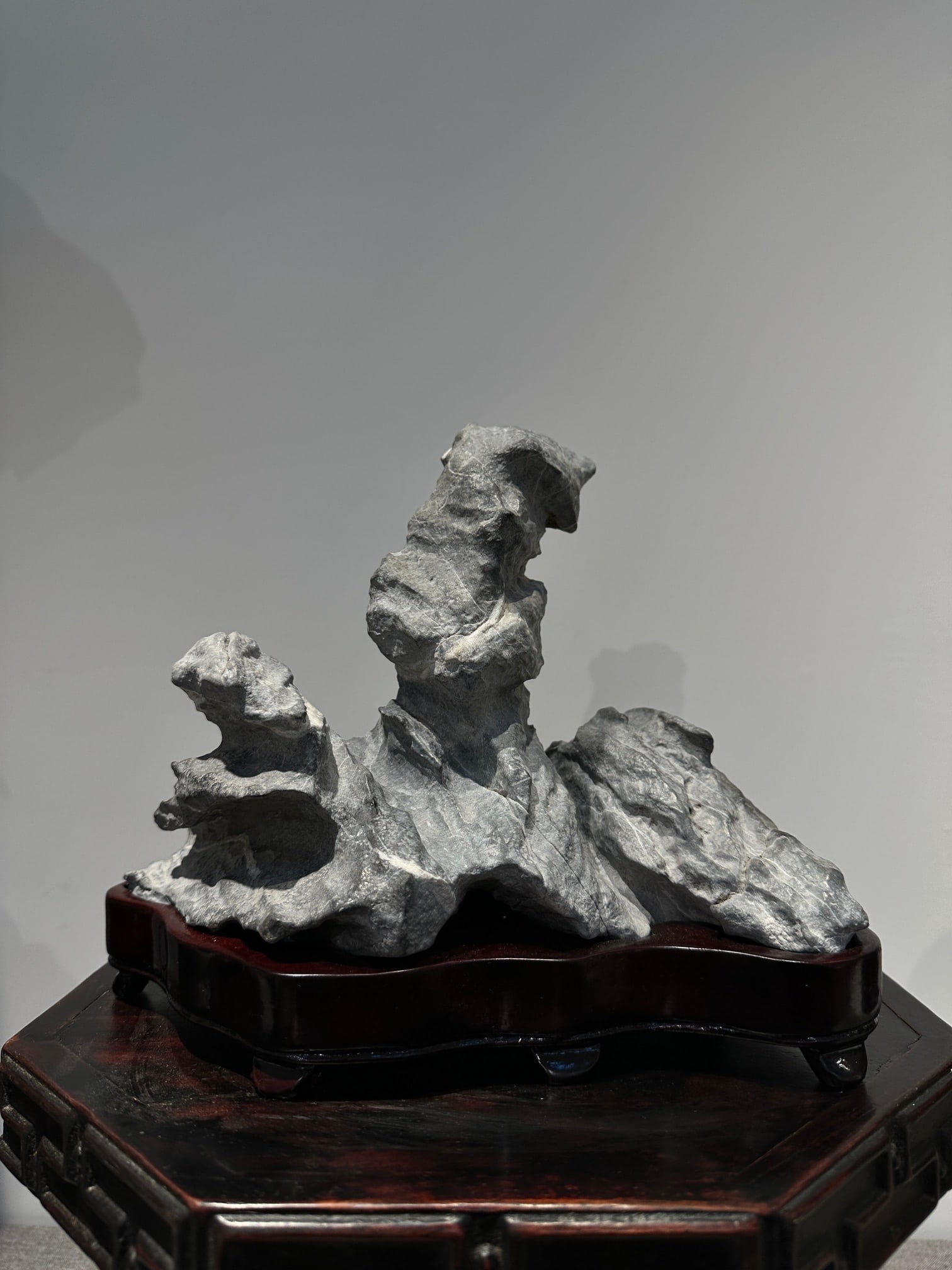 An Exquisite Lingbi Stone Rockery Ornament: An Exquisite Lingbi Stone Rockery Ornament Qing Dynasty, China Size:10.2inx8.7inx5.9in灵璧石山子摆件 中国清代 Size:26cmx22cmx15cm