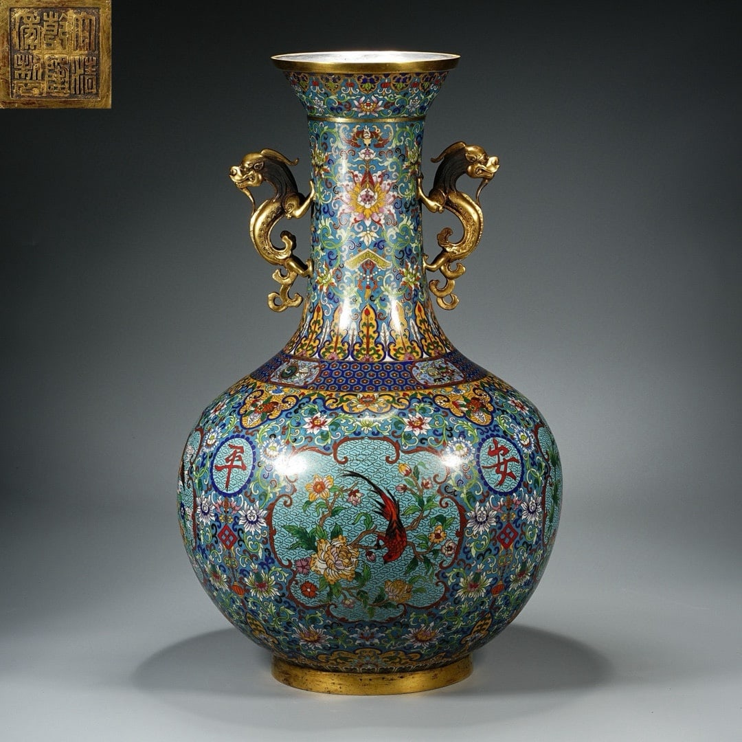 An Exquisite Cloisonne Lotus Pattern Flower and Bird Pattern Double-Ears Vase: An Exquisite Cloisonne Lotus Pattern Flower and Bird Pattern Double-Ears Vase Qing Dynasty, China Qianlong Six-character Mark Size:21.3inx13.4in Weight:19kg景泰蓝缠枝!