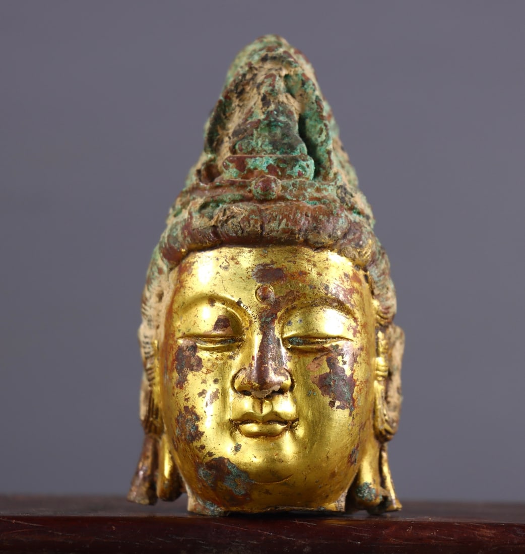 An Exquisite Gilt Bronze Buddha head (1 of 9)