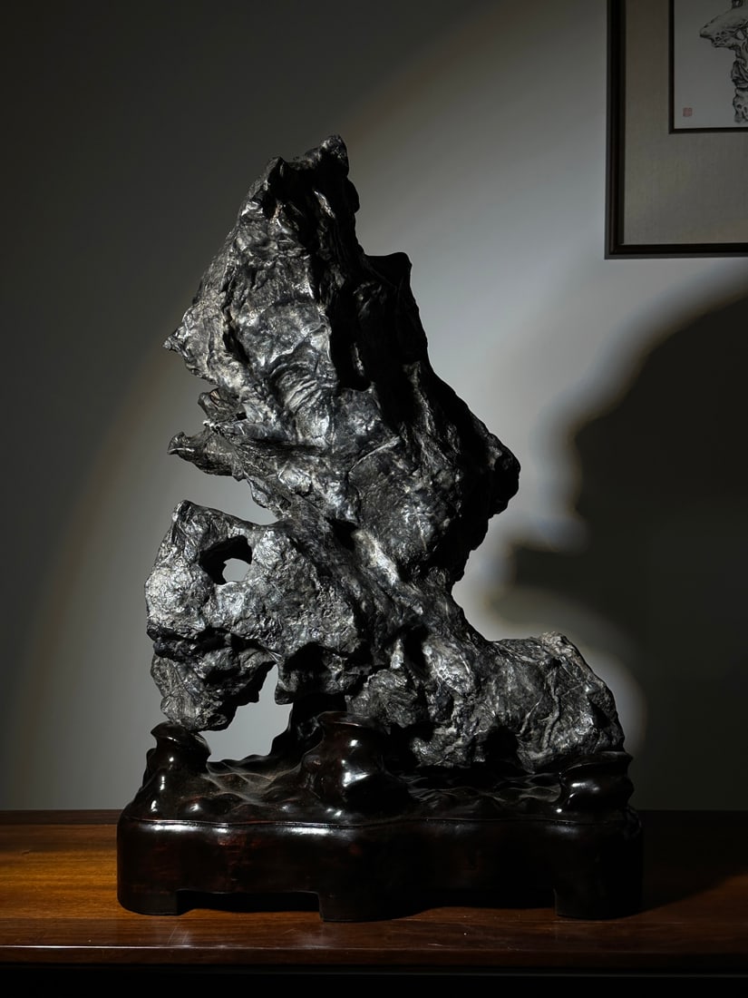 An Exquisite Lingbi Stone Rockery Ornament: An Exquisite Lingbi Stone Rockery Ornament Qing Dynasty, China Size:29.5inx18.9inx10.2in灵璧石山峰摆件 中国清代 Size:75cmx48cmx26cm