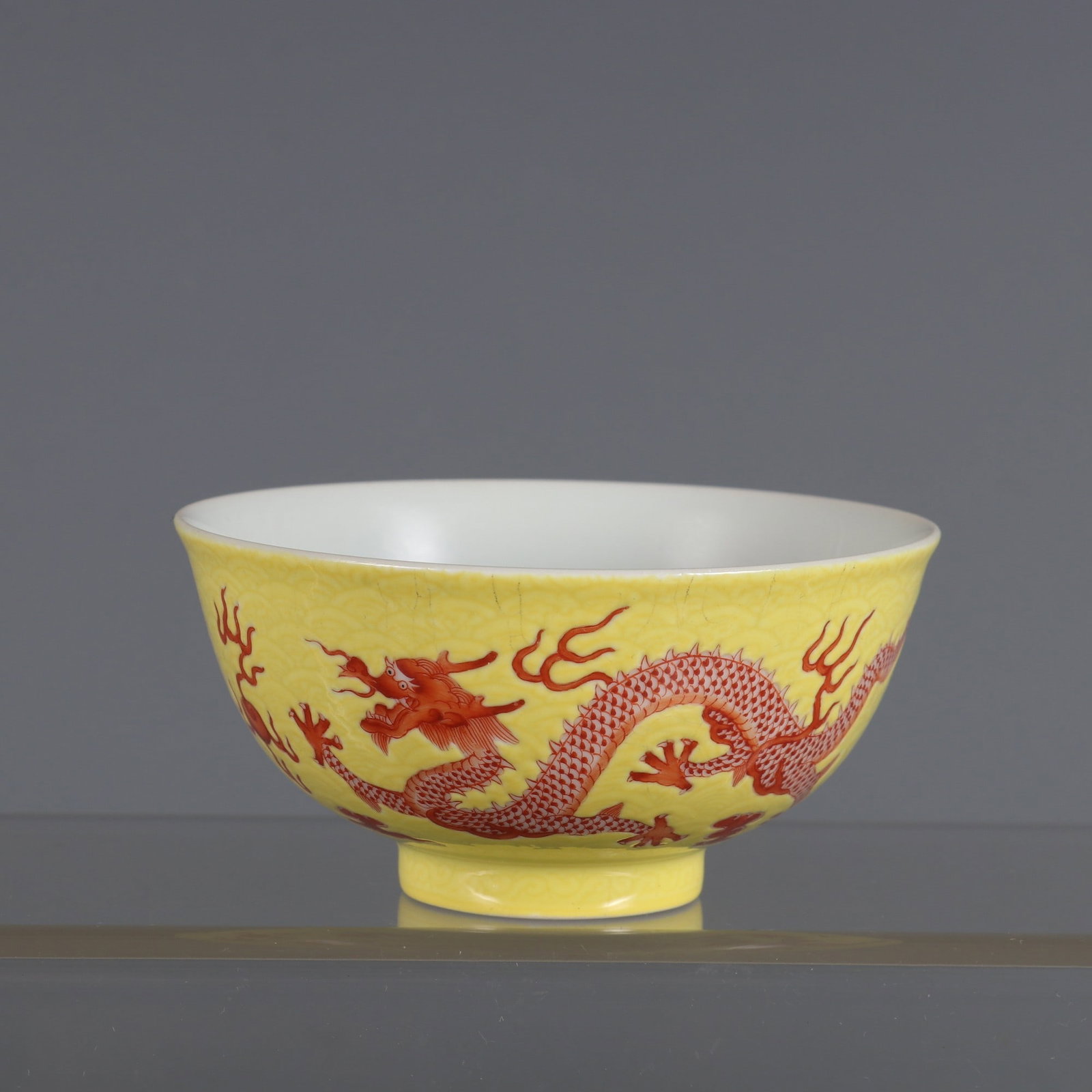 An Exquisite Iron-Red Dragon Pattern Cup: An Exquisite Iron-Red Dragon Pattern Cup Qing Dynasty, China Yongzheng Six-character Mark Size:2inx3.8in黄地矾红彩双龙赶珠杯 中国