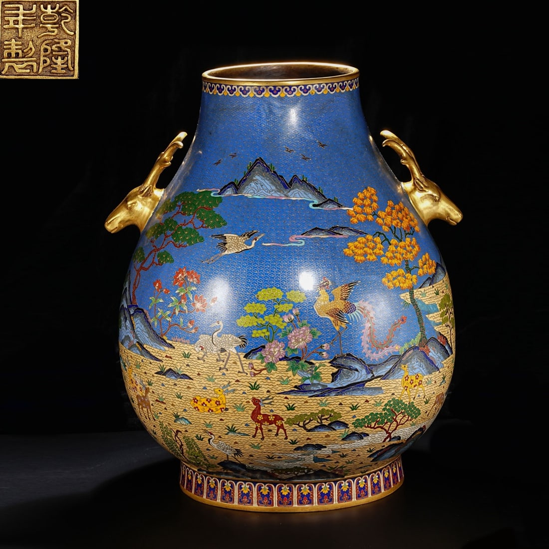 An Exquisite Cloisonne Sika Deer Pattern Flower and Bird Pattern Double-Ears Vase: An Exquisite Cloisonne Sika Deer Pattern Flower and Bird Pattern Double-Ears Vase Qing Dynasty, China Qianlong Four-character Mark Size:18.9inx15.7in Weight:16kg景泰蓝鹿头