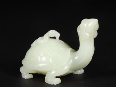 An Exquisite White Jade Auspicious Beast Ornament