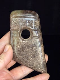 An Exquisite White Jade Pendant