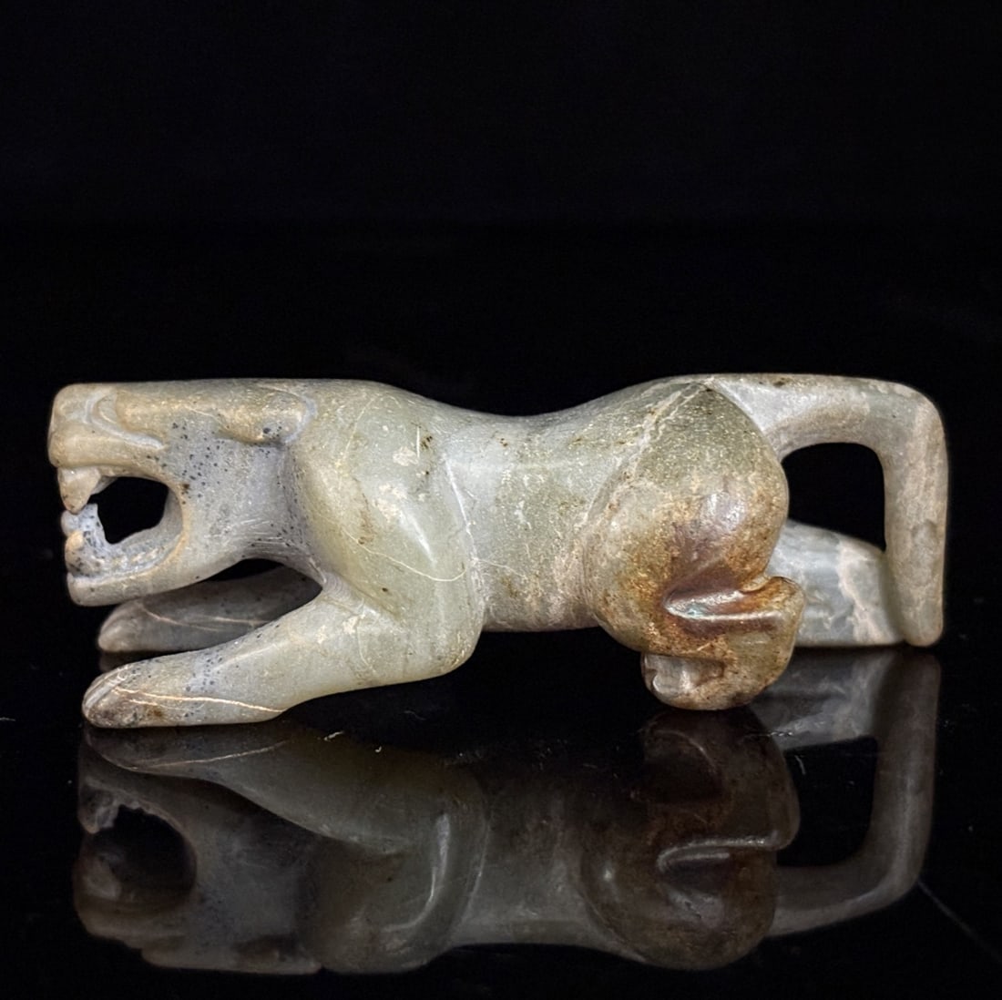 An Exquisite White Jade Tiger Ornament (1 of 9)