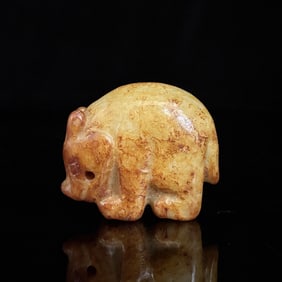 An Exquisite White Jade Auspicious Beast Ornament